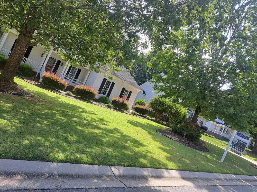 Top-rated landscape installation with custom design in Clayton, NC by Lawnshark Lawncare