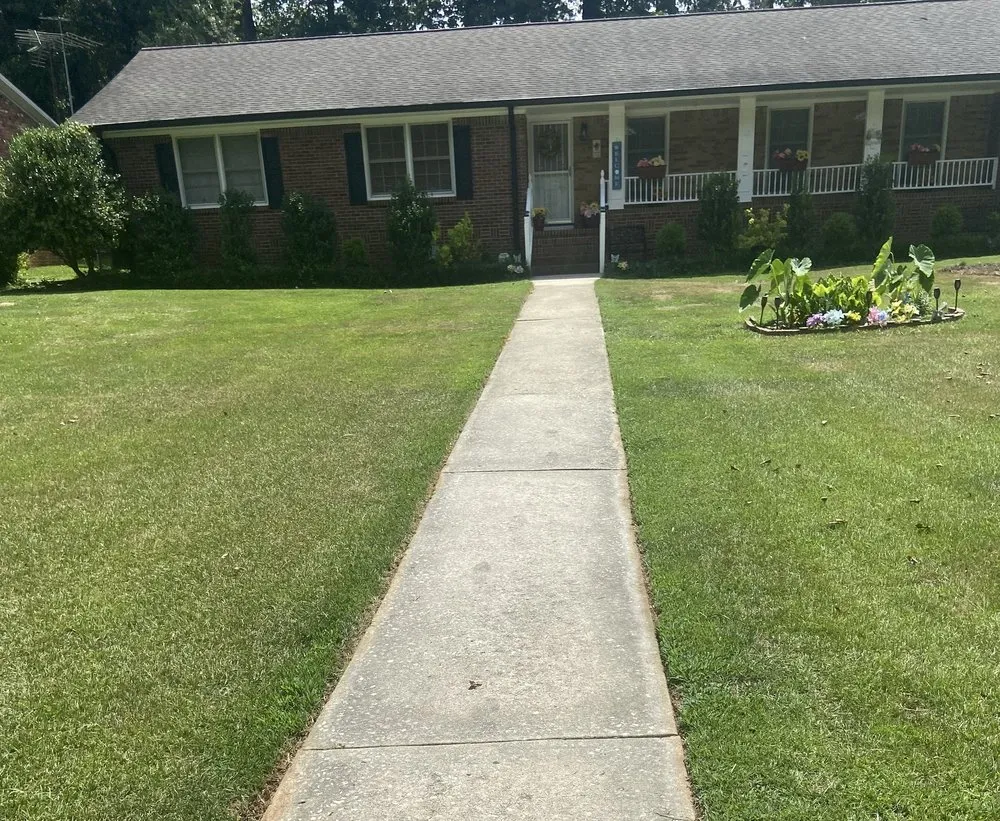Custom yard cleanup service for residential properties in Rex, GA by Layen’s Lawn Care
