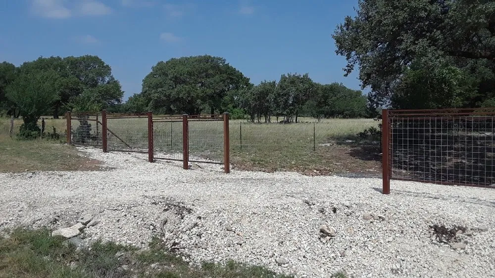 Custom landscape design with custom design in Georgetown, TX by Lay's Fencing & Land Clearing
