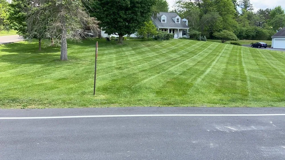 Top-rated lawn mowing service in Syracuse, NY - Lazer line Landscaping