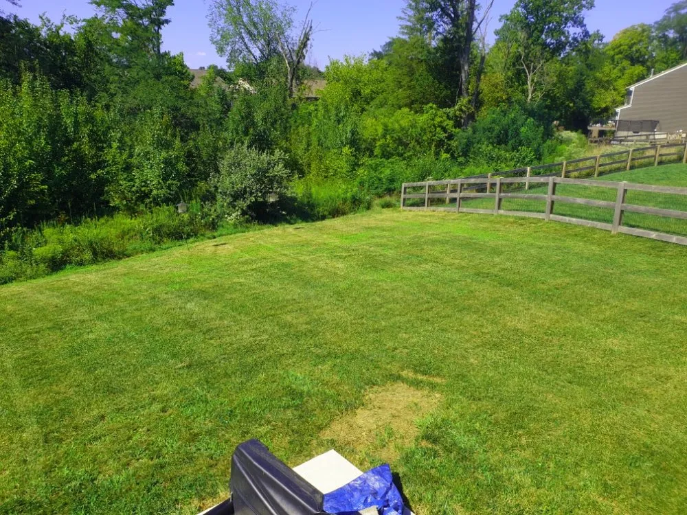 Affordable landscape design in West Chester Township, OH by Laziz Lawn Mowing