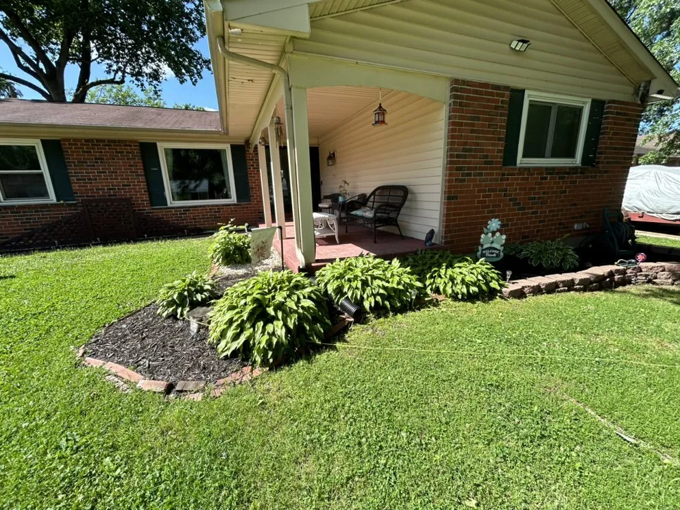 Professional lawn mowing service for year-round maintenance across Florissant, MO - Lazy Lawns