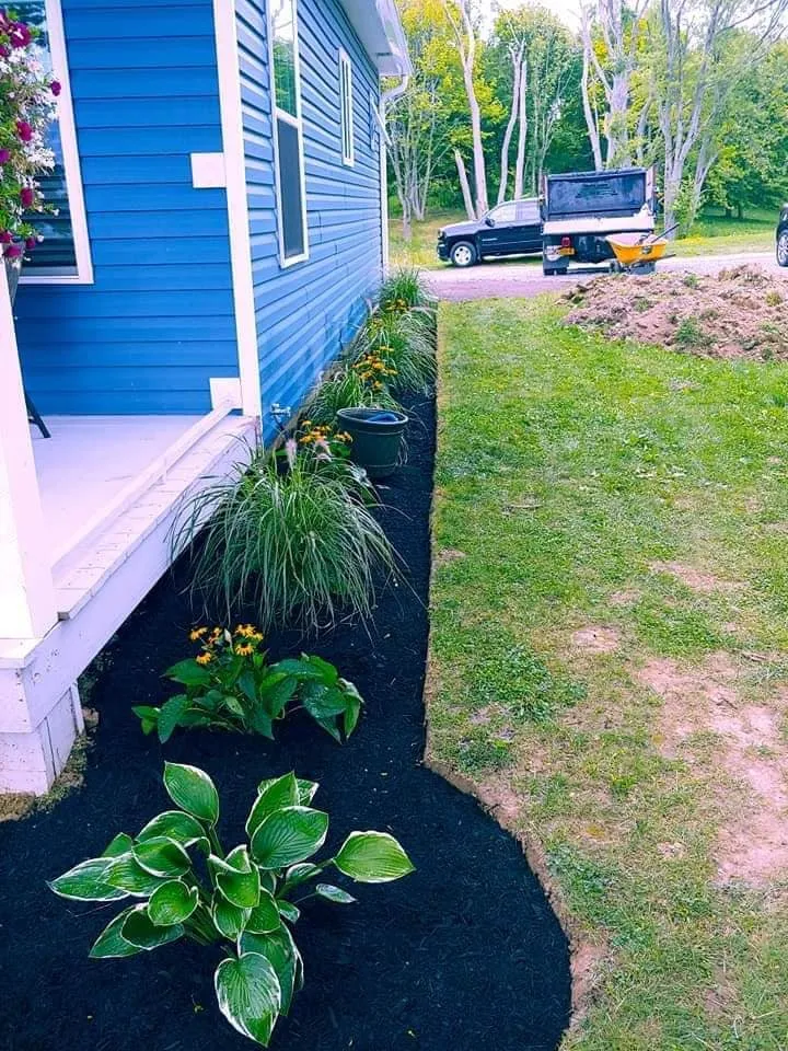 Affordable yard cleanup service with custom design in Brockport, NY by LC Property Maintenance & Landscape