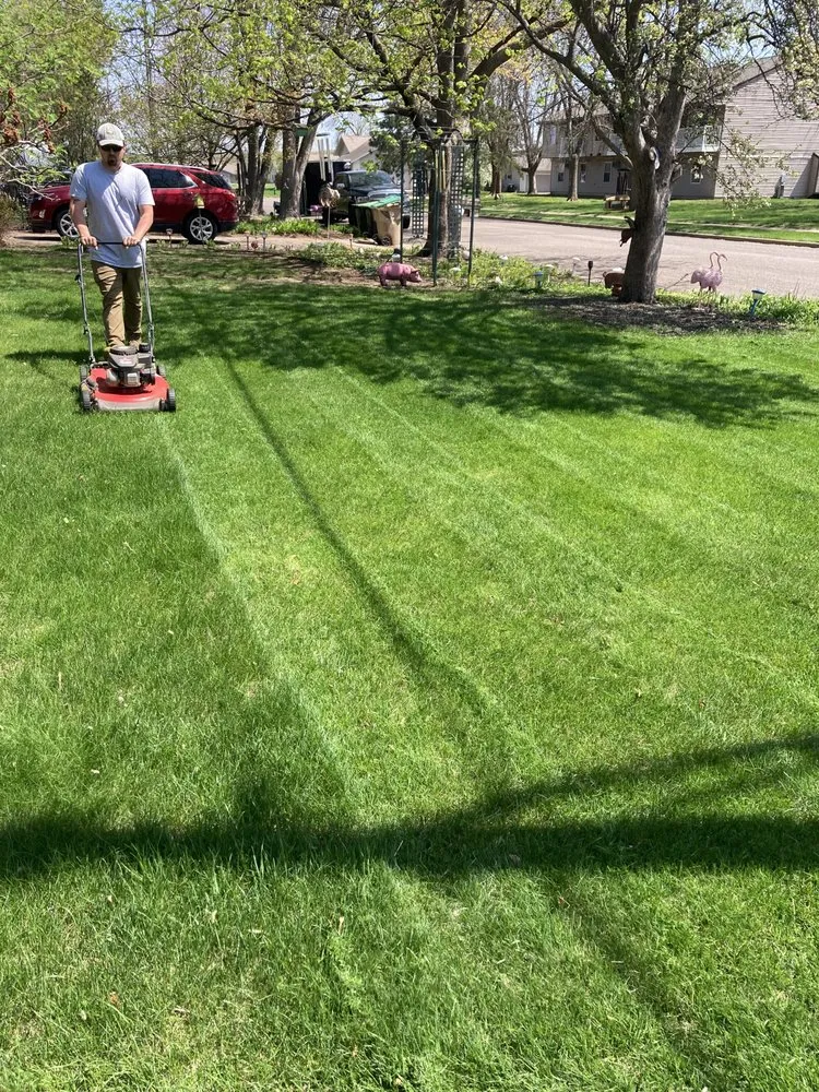 Custom landscape installation in Cadott, WI by Leading Edge Lawn Care