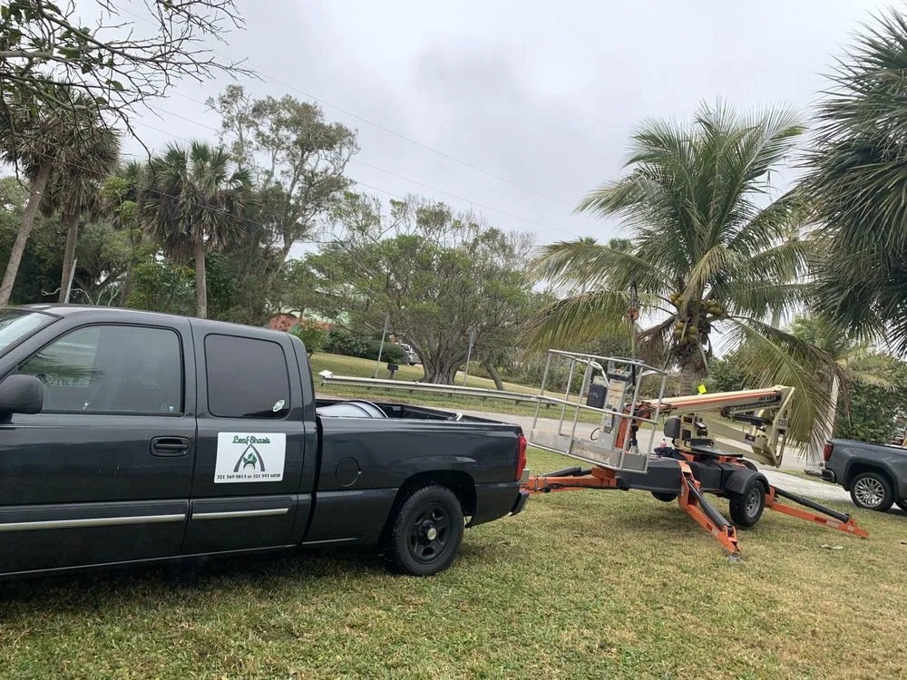 Custom lawn care service for residential properties in Titusville, FL by LEAF SHARK Landscape Services of Brevard
