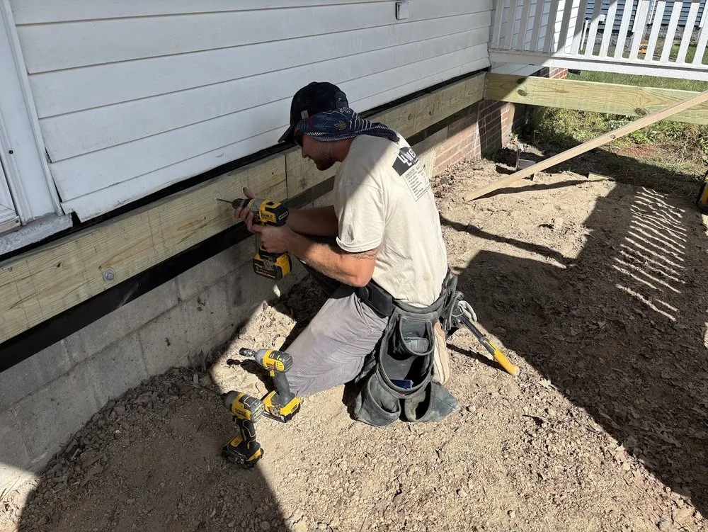 Local lawn mowing service for outdoor upgrades in Bettendorf, IA by Leathers Construction Group