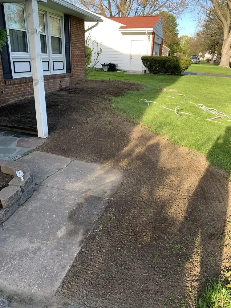 Affordable yard cleanup service with custom design in Hilton, NY by LeBeau Property Management
