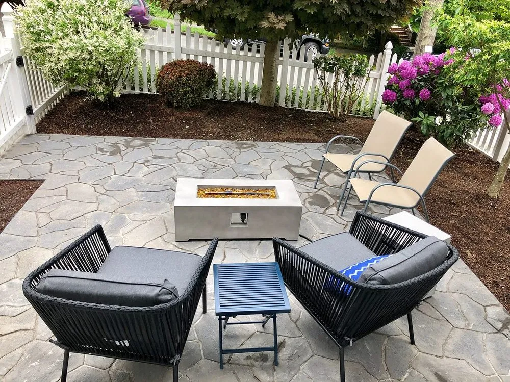 Expert lawn mowing service with custom design in Seattle, WA by Lee's General Landscaping and Yard Clean Up