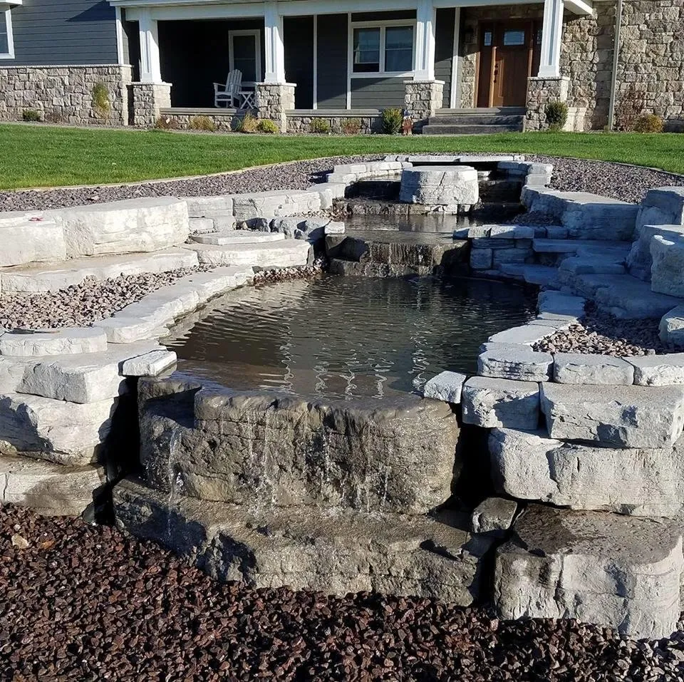 Custom outdoor landscaping with custom design in Cedar Rapids, IA by Lee's Lawn and Landscape