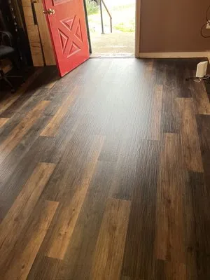 Lee’s Mowing More Logo