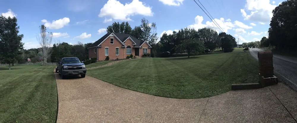 Custom outdoor landscaping with custom design in Franklin, TN by Legacy Land Management