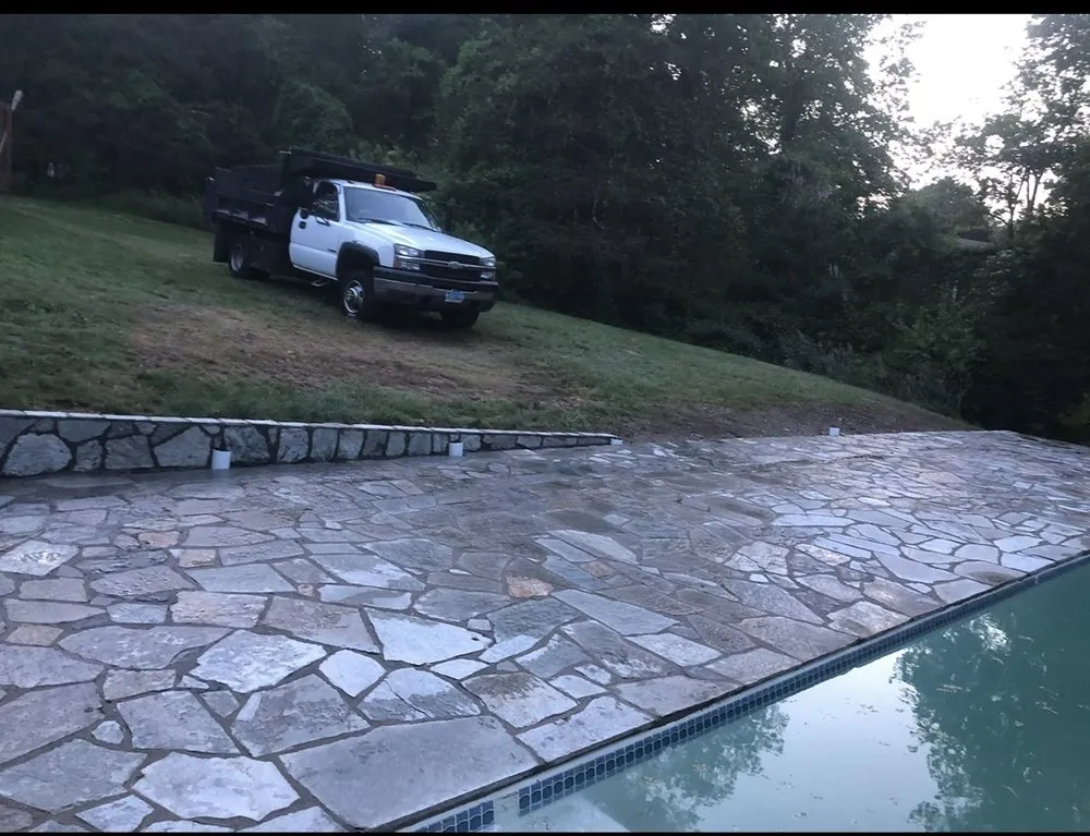 Expert landscaping services for residential properties in Norwalk, CT by Legacy Mason Contractors