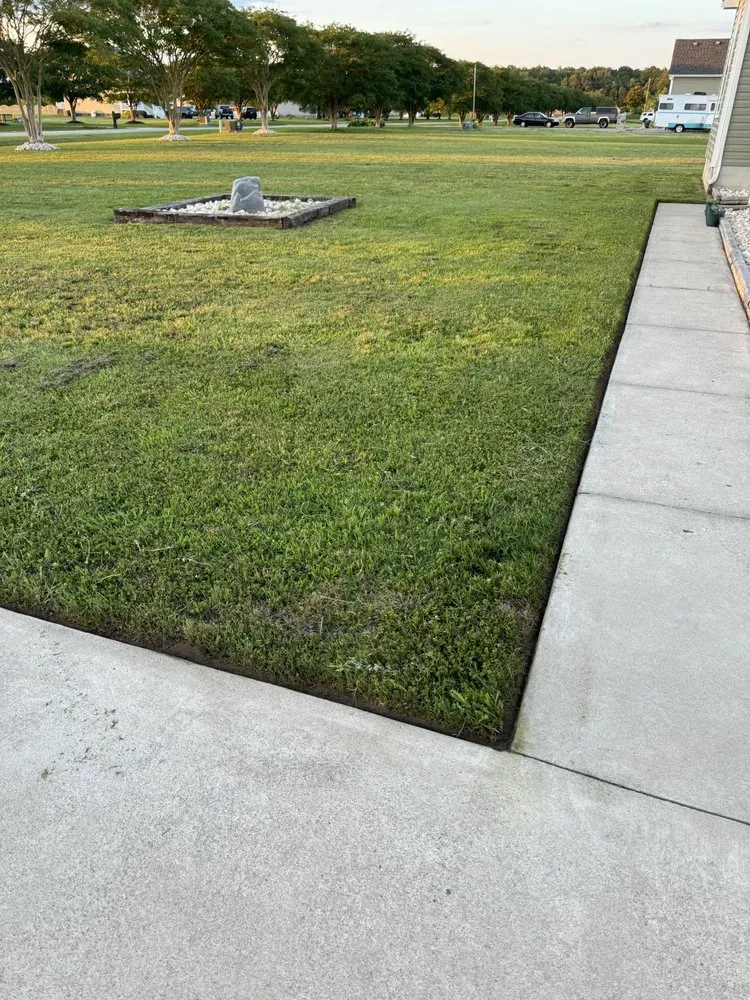 Expert lawn care service for residential properties in Moyock, NC by Legacy Mowing and Outdoor Services