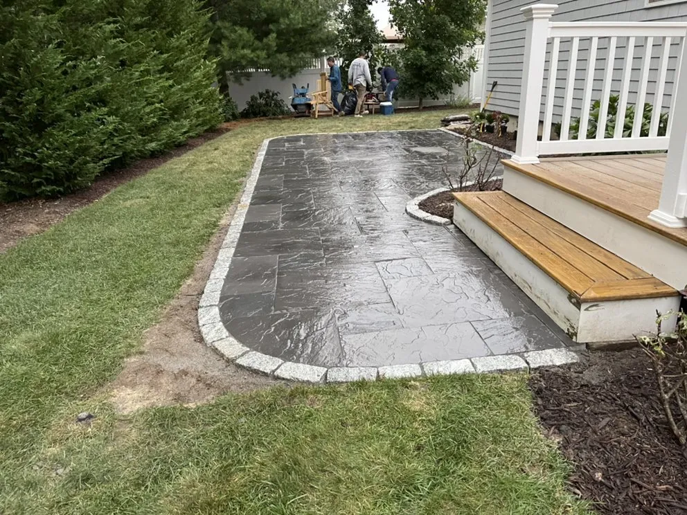 Custom landscape installation in West Yarmouth, MA - Legendary Masonry