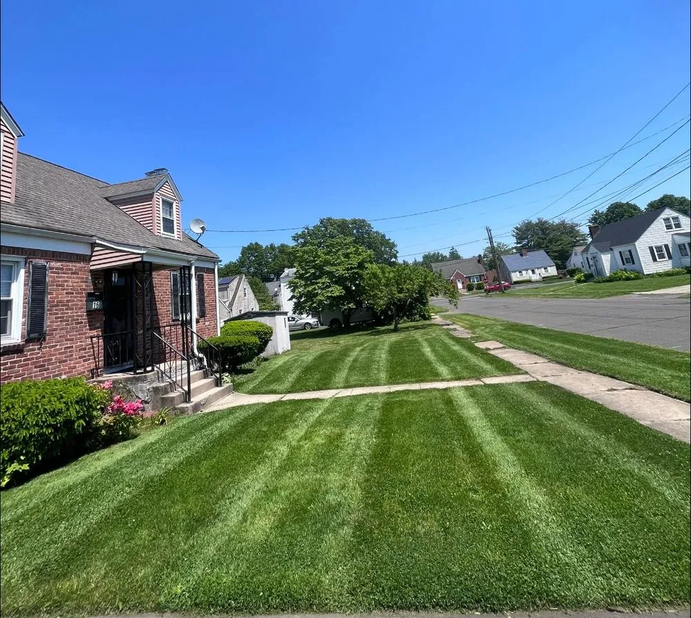 Affordable lawn mowing service for outdoor upgrades across New Britain, CT - Lentini Landscaping