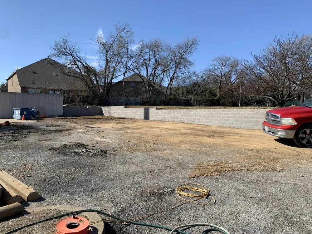 Professional lawn care service for outdoor upgrades in Euless, TX by Leota Landscaping and Construction