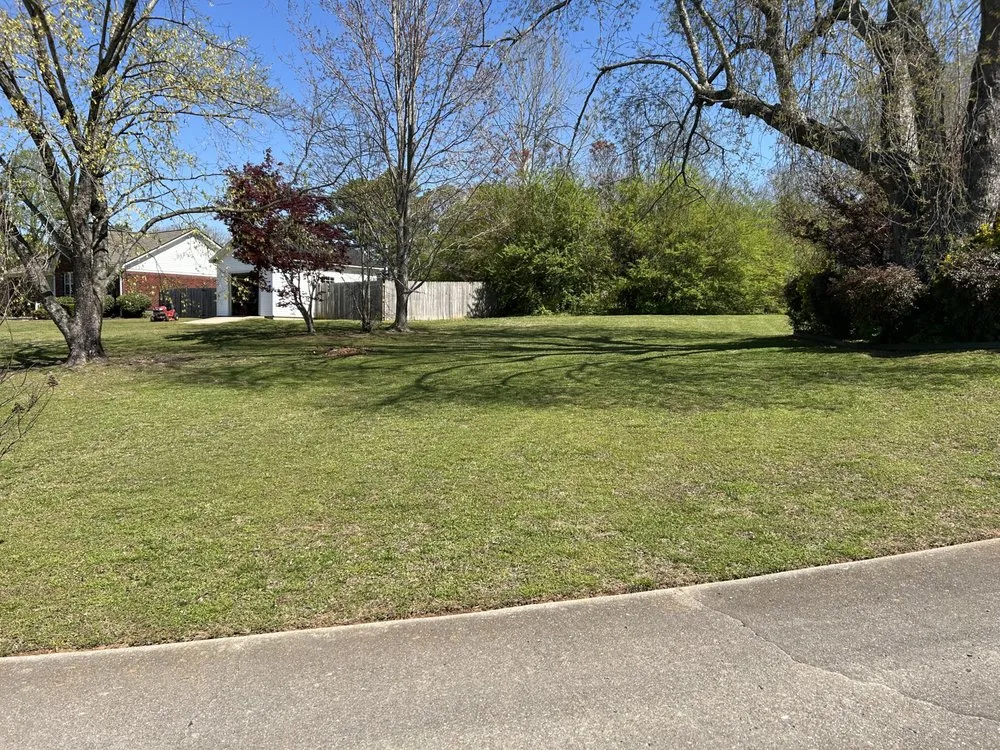 Affordable lawn mowing service for year-round maintenance in Huntsville, AL by Leslie & Son Lawn Care