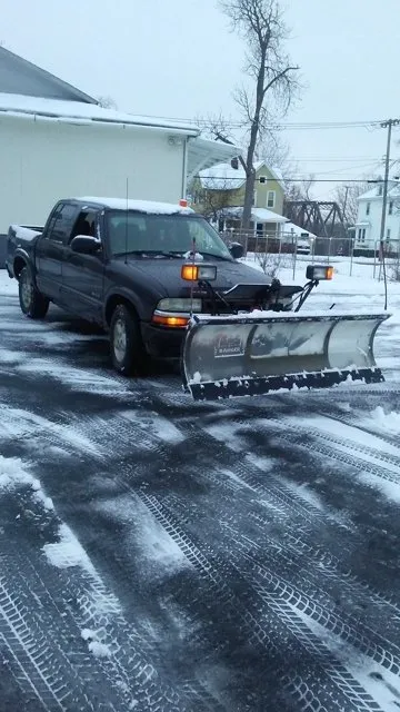 Expert lawn mowing service for beautiful yards in Newark, NY by Let It Snow Plowing Landscaping Company