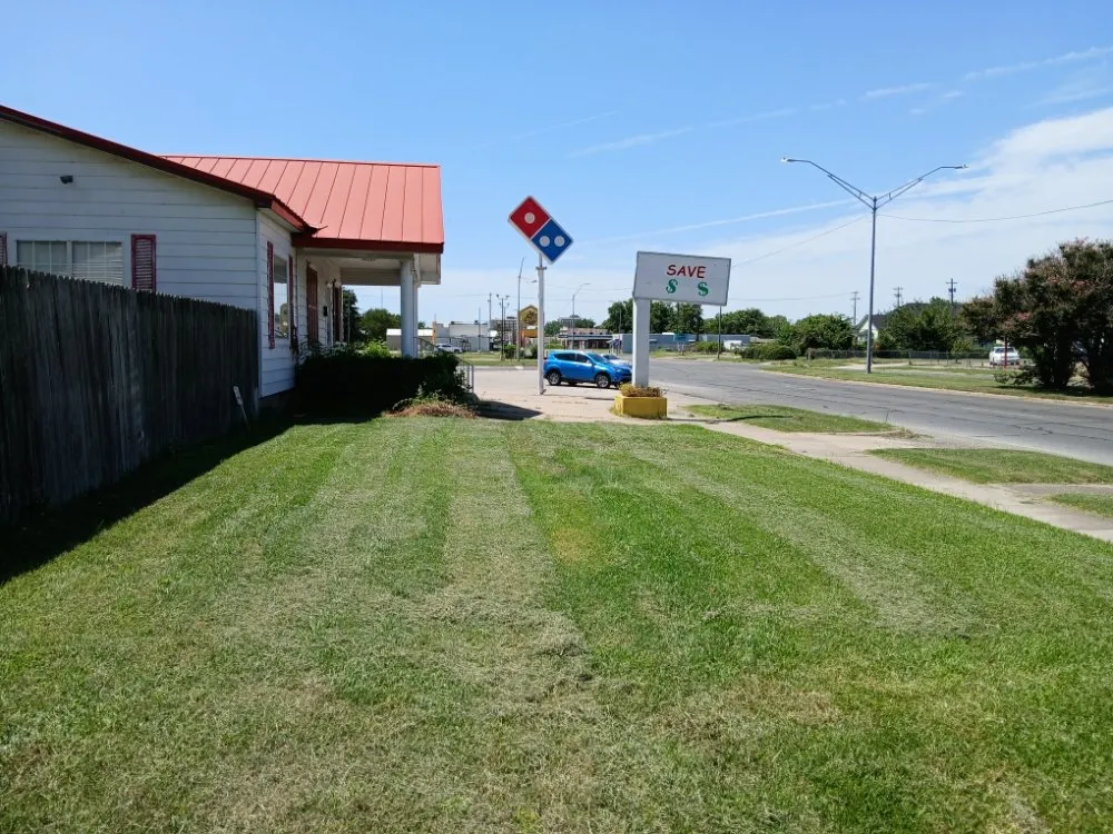 Custom lawn mowing service in Muskogee, OK by Let There Be Lawn