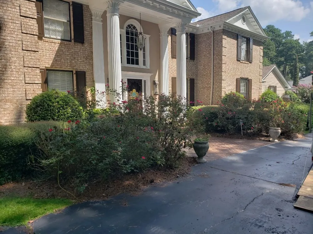 Professional lawn care service for residential properties across Augusta, GA - Let Us Give You a Hand Landscaping