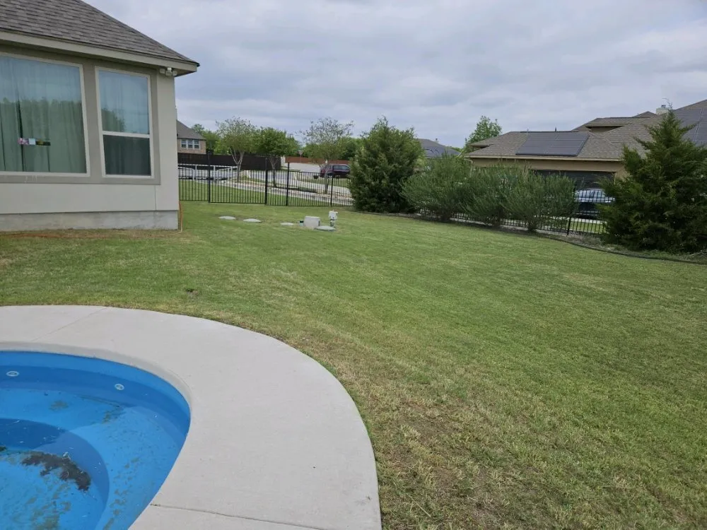 Custom lawn mowing service with custom design across Saint Hedwig, TX - Let's Get It Lawncare Services