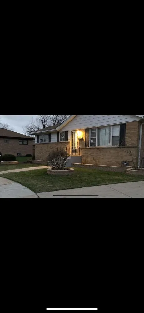 Custom residential landscaping in Maywood, IL by Lets Reason Lawn Service