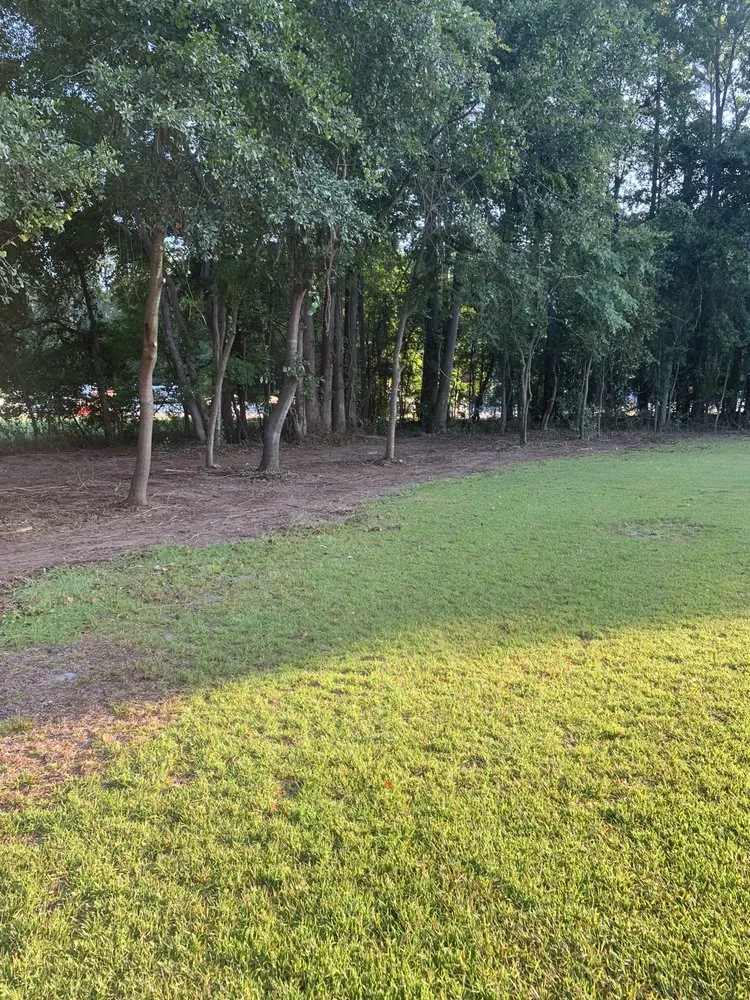 Custom landscape design with custom design in Roseboro, NC by Leveled Up Excavation and Landscaping