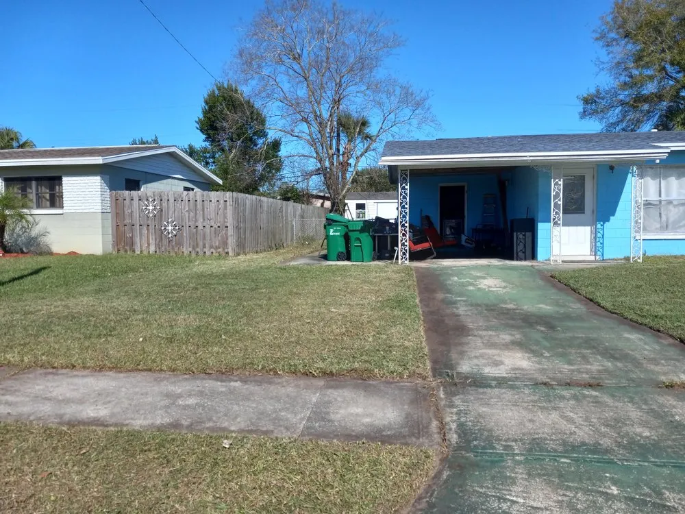 Professional lawn mowing service for year-round maintenance across Titusville, FL - Lewis & Son Lawn Care