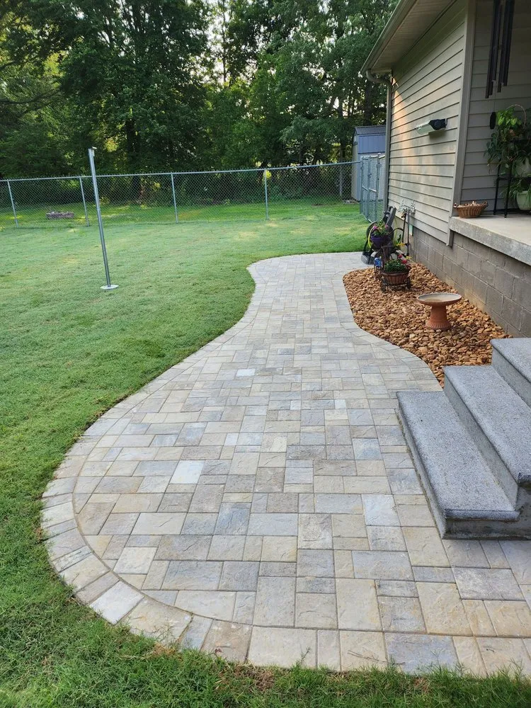 Custom landscaping services for year-round maintenance in Paris, TN by Lewy's