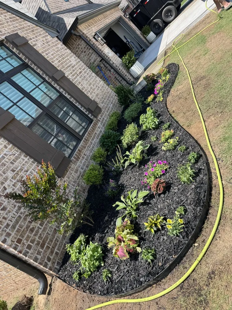 Professional yard maintenance with custom design in Tulsa, OK by LFE Landscaping & Junk Removal