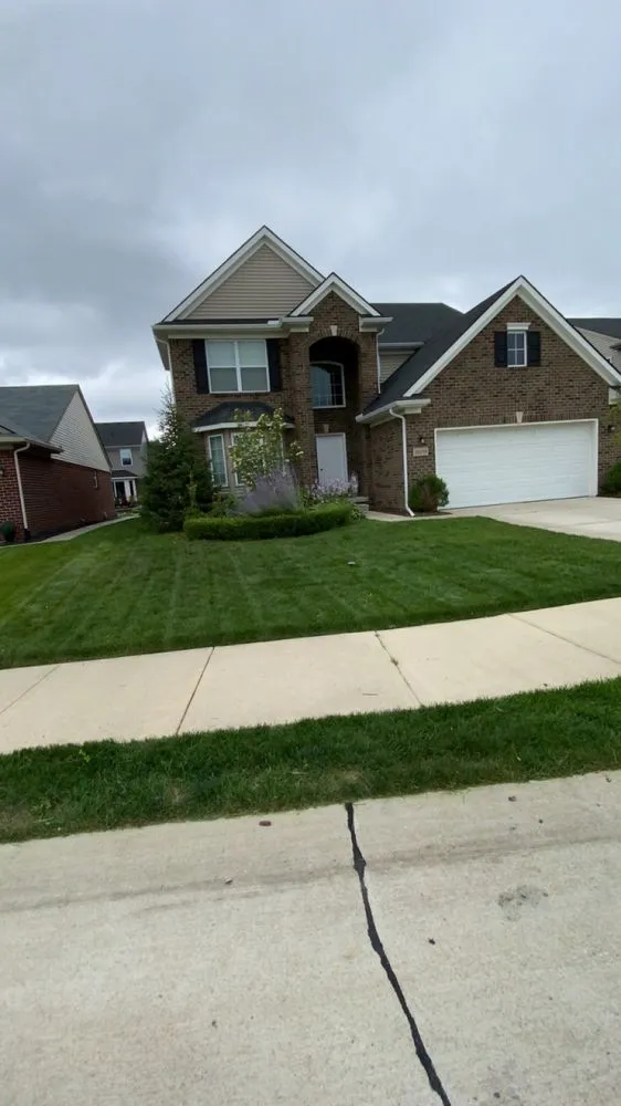 Affordable landscape installation with custom design in Lansing, MI by L&H Lawn Care