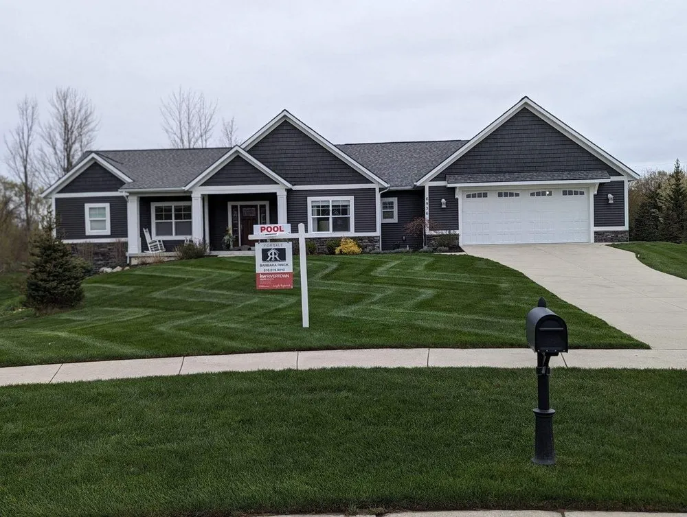 Custom lawn care service for year-round maintenance in Lansing, MI by LHS Services