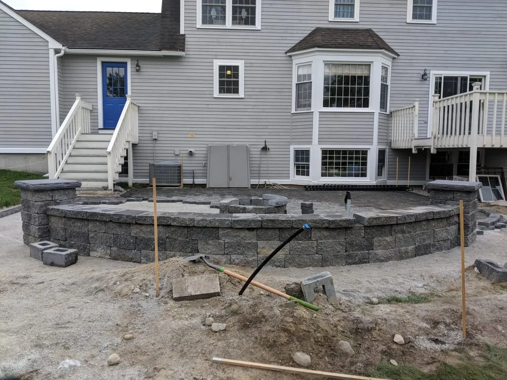 Professional landscape installation with custom design in Westford, MA by Liam's Lawn And Landscaping