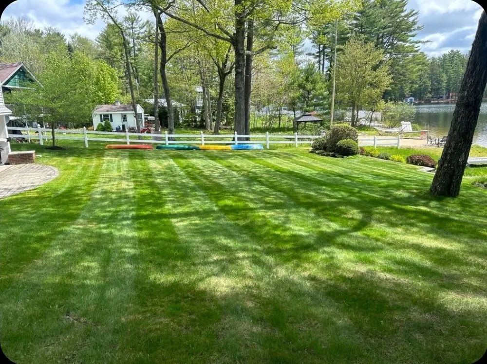 Professional yard maintenance for residential properties across Raymond, ME - Libby's Property Maintenance