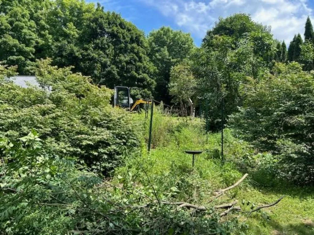 Custom landscape installation with custom design across Raymond, ME - Libby's Property Maintenance