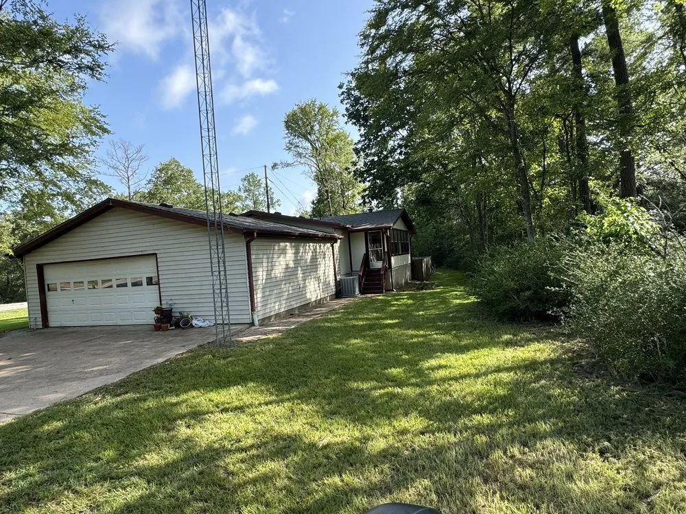 Professional landscape installation with custom design across Trinity, TX - Liberty Lawn Care