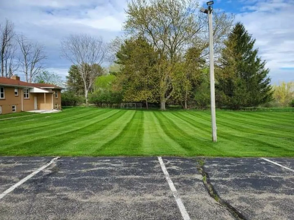 Affordable yard maintenance for beautiful yards in Reed City, MI by Liberty Lawncare & Landscaping