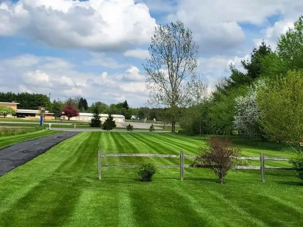 Affordable residential landscaping for year-round maintenance in Reed City, MI by Liberty Lawncare & Landscaping