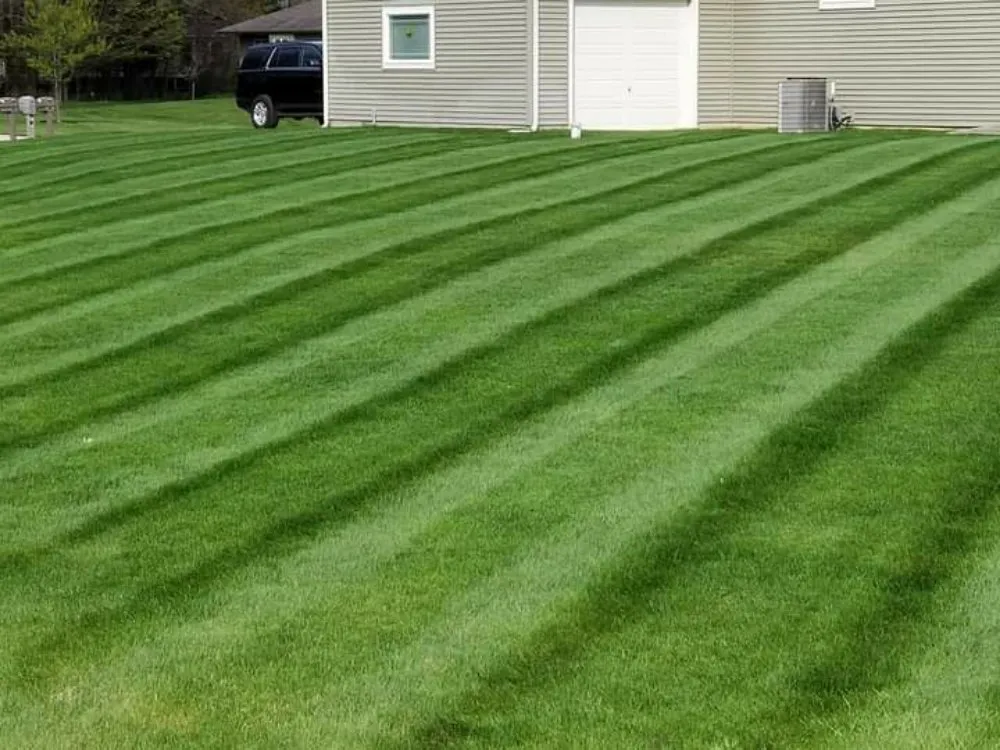 Reliable lawn mowing service in Reed City, MI by Liberty Lawncare & Landscaping