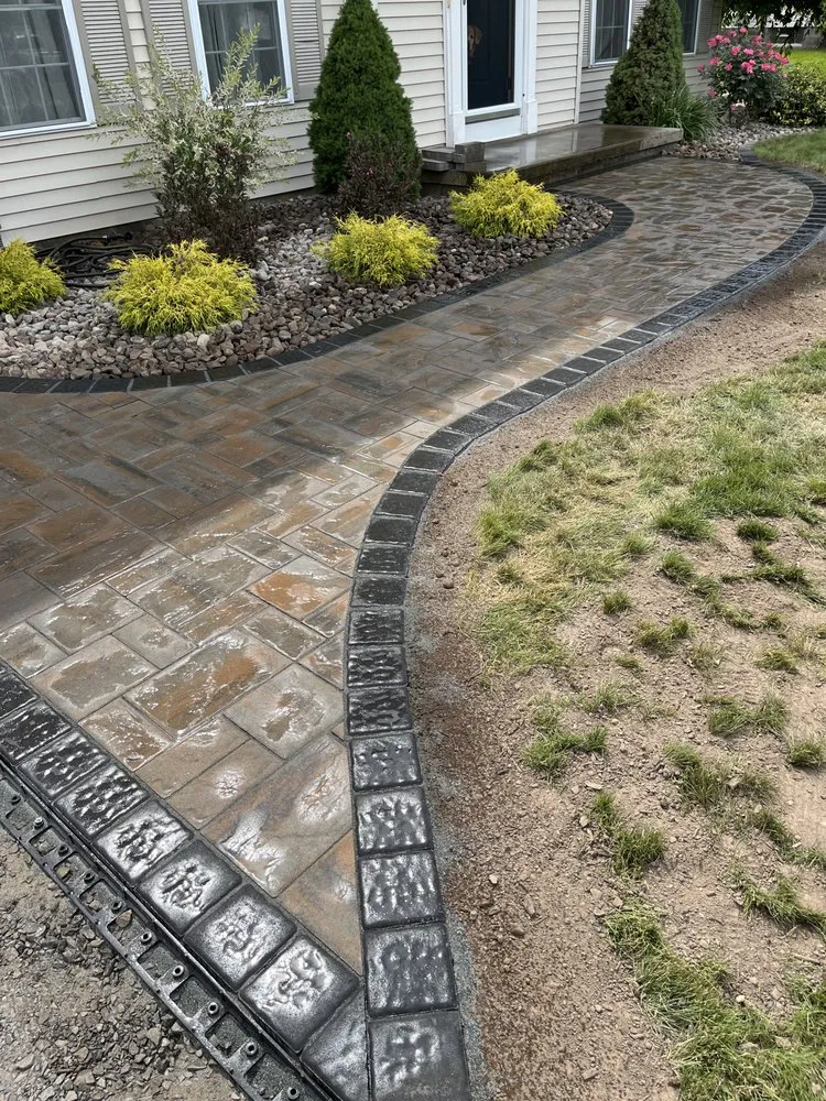 Reliable yard cleanup service for homes in Rochester, NY by Licata Landscape and Design