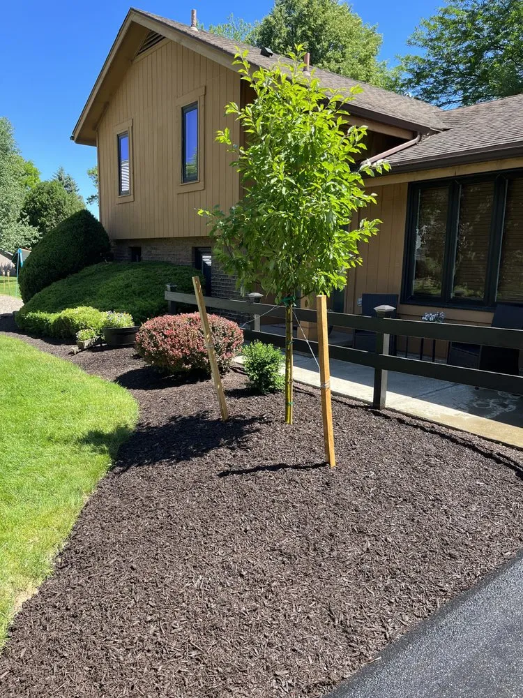 Trusted lawn mowing service for residential properties in Rochester, NY by Licata Landscape and Design