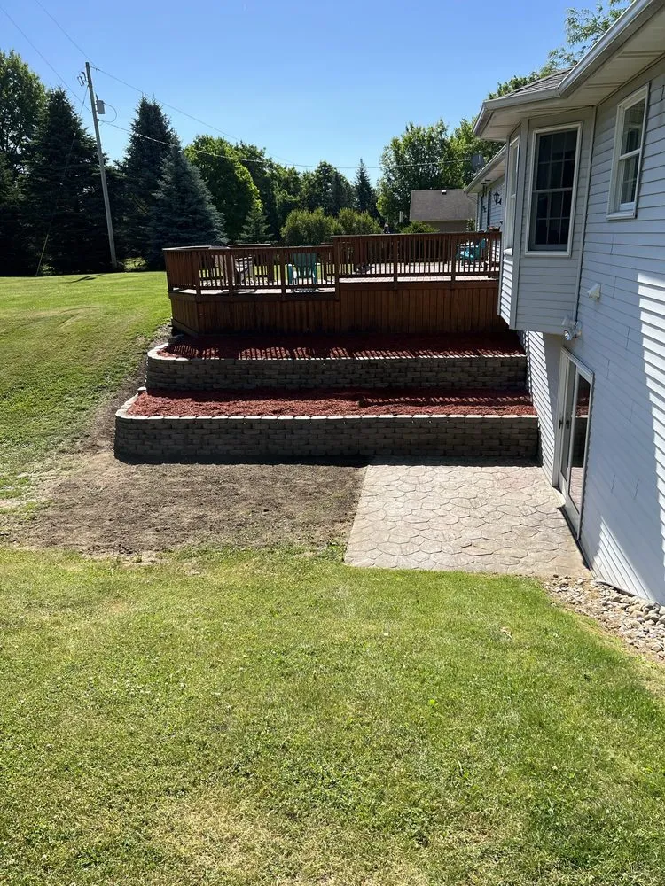 Professional outdoor landscaping for residential properties in Gaines, MI by Lichon Services