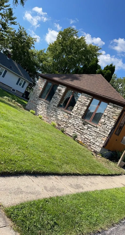 Affordable landscape installation with custom design across Oshkosh, WI - Lietz Lawn Tree and Snow