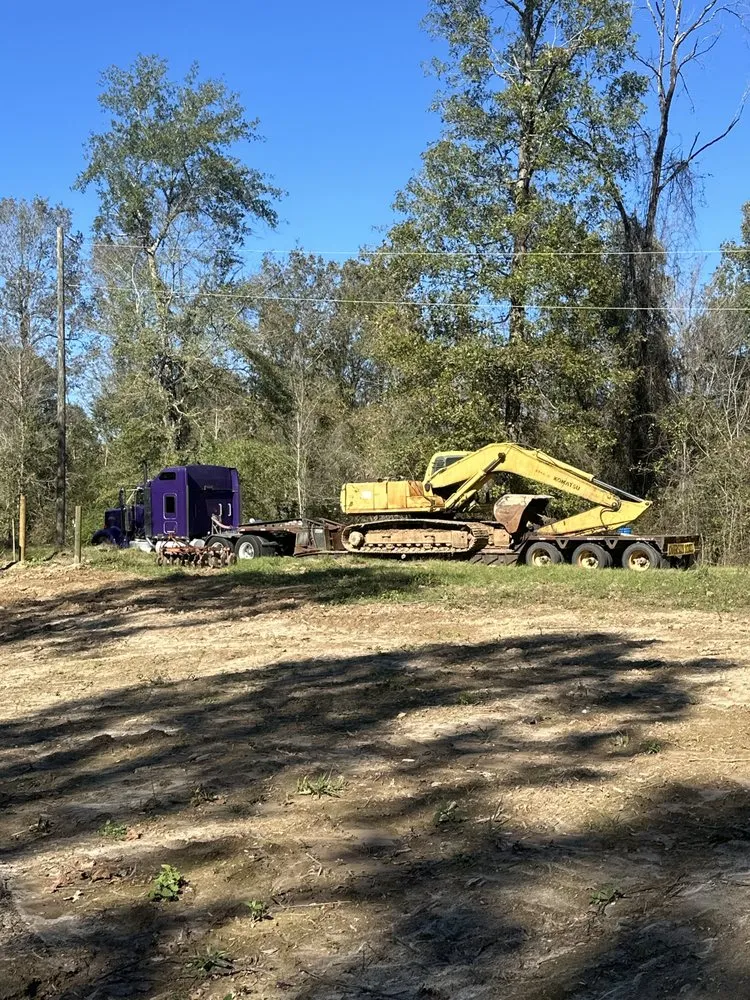 Custom landscape installation with custom design across Sumrall, MS - Lil Lucy Farms