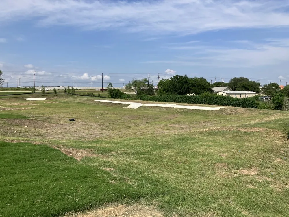 Professional yard cleanup service for year-round maintenance in San Antonio, TX by Lil Orange Tractor Services Lawn Care & Landscape Maintenance