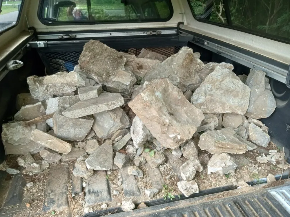 Custom landscape design for year-round maintenance in Gulfport, MS by Lil' Red Tractor Services