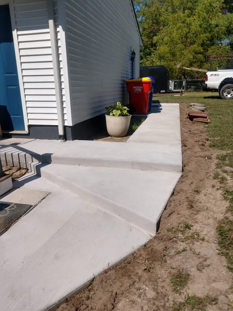 Trusted lawn mowing service for homes in Ellendale, DE by Lilly lawn and landscaping