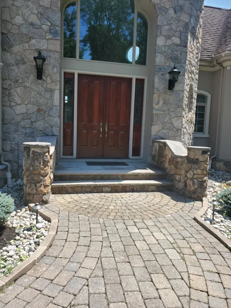 Professional landscape installation for residential properties in North Plainfield, NJ by Lily Pad Ponds