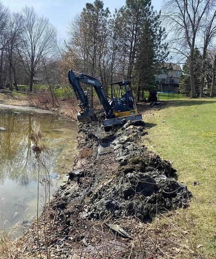 Expert yard cleanup service for year-round maintenance in Maple Grove, MN by Lindquist Enterprises