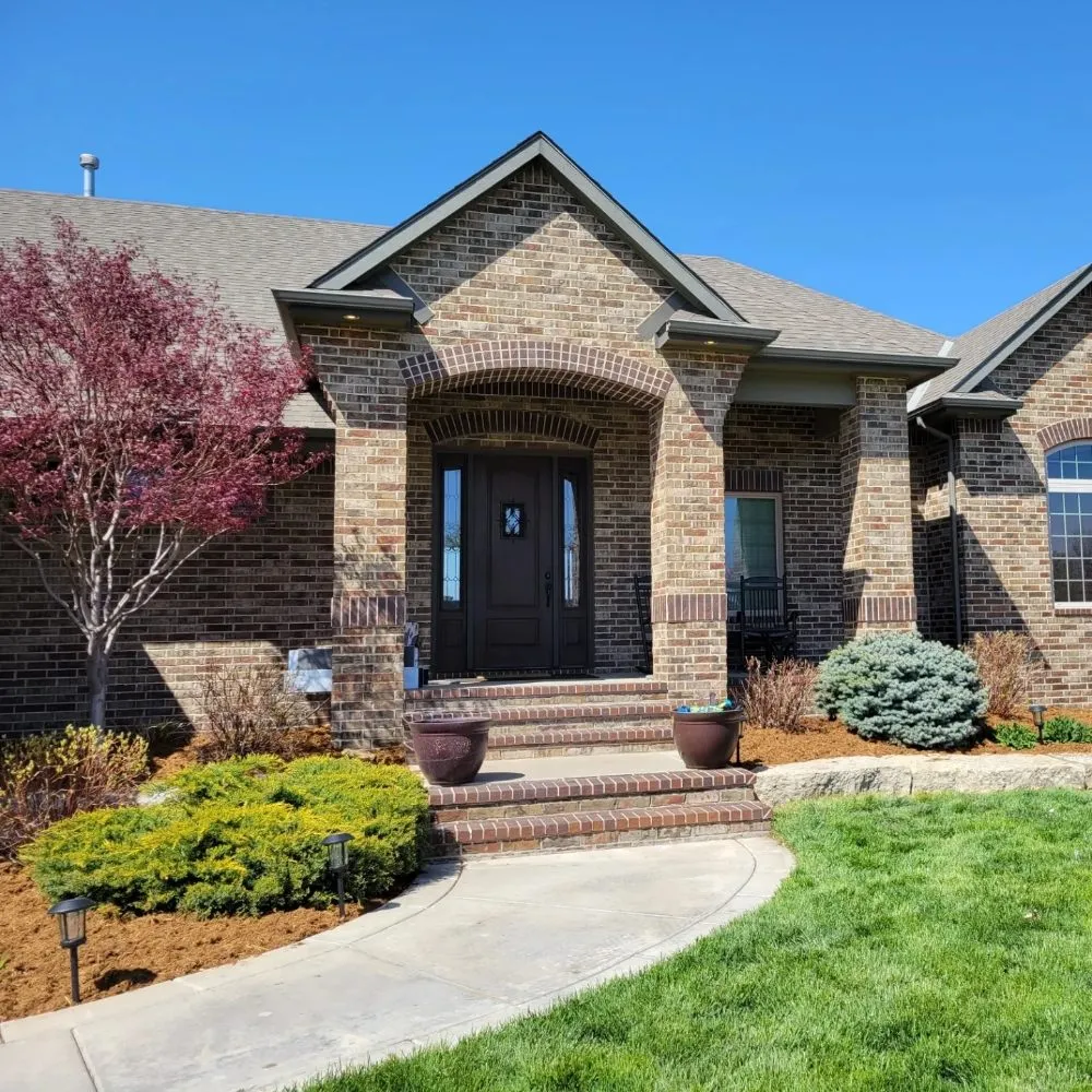 Trusted yard cleanup service for residential properties in Valley Center, KS by Lindsay & Co. Landscaping